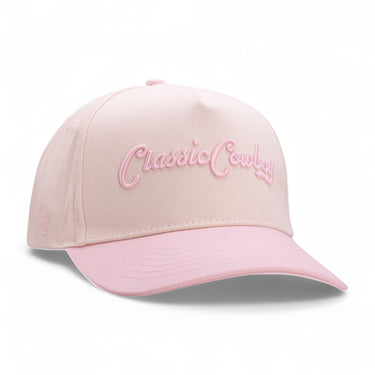 Classic Cowboy The Dolly cream western snapback with light pink brim and tonal embroidery.