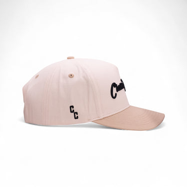 The Sahara tan and off-white western cap, side view.