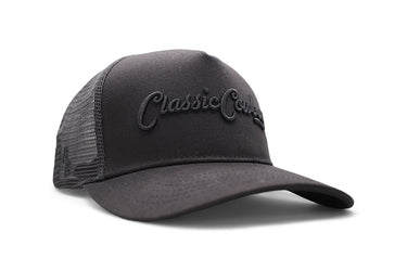 Classic Cowboy The Midnight Maverick black-on-black western trucker hat with mesh back.