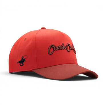 Classic Cowboy The Setter red-orange western snapback with brown suede brim and tonal embroidery.