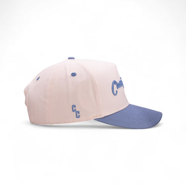 The True Blue cream and blue western snapback, side view.
