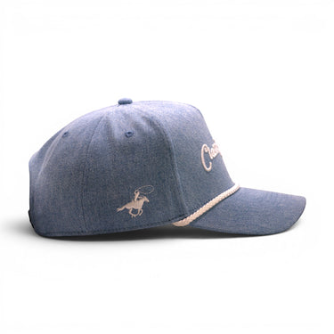 Classic Cowboy The Drifter washed denim-style snapback, side view of the cowboy logo.