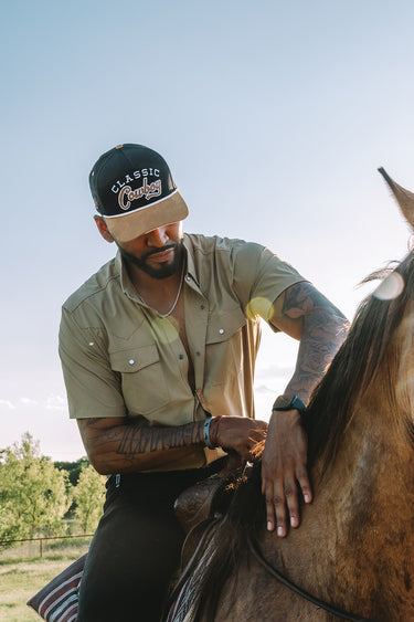 Classic Cowboy The Bandera roper hat worn, lifestyle photo.