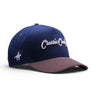 Classic Cowboy The Cal navy western snapback with grey suede brim and raised embroidery.