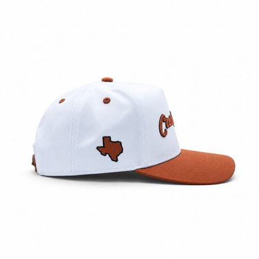 Classic Cowboy The Capitol white and rust snapback, side view of the rust Texas logo.