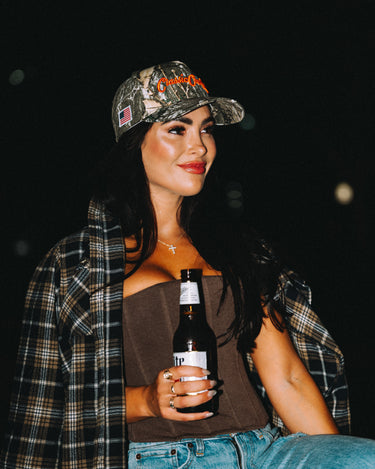 The Marksman camo cap by Classic Cowboy, angled view.