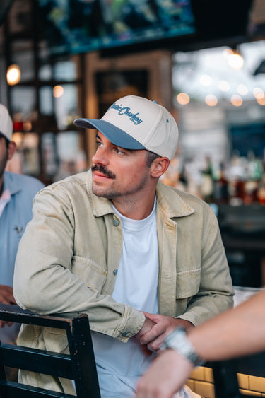 The True Blue snapback by Classic Cowboy, angled view.