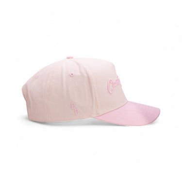 The Dolly cream and pink western snapback, side view.