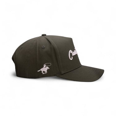 The Evergreen forest green western cap, side view.