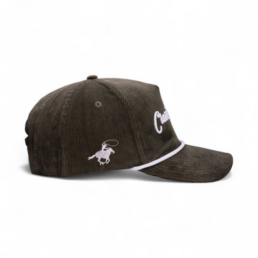 The Fern olive green corduroy snapback, side view.