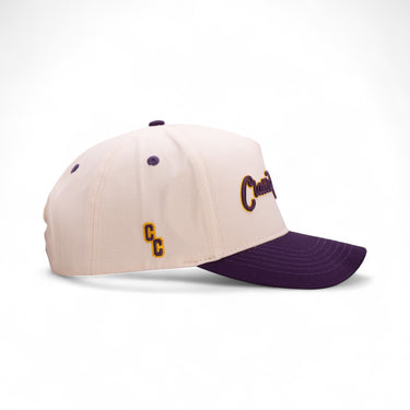 The Luka purple and gold western snapback, side view.