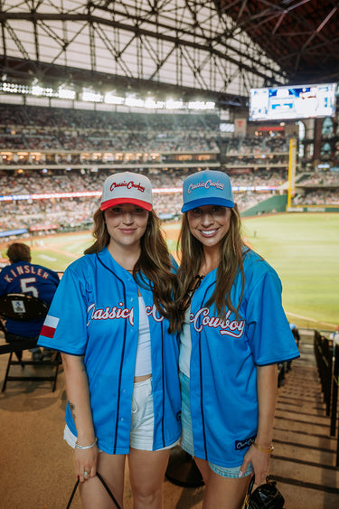 Classic Cowboy powder blue baseball jersey with Texas flag sleeve detail, side view.