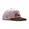 Classic Cowboy The Sierra two-tone western snapback with cream crown, brown bill, and embroidered mountain artwork.
