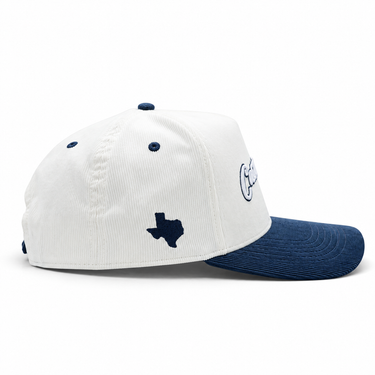 Classic Cowboy The Landry white and navy corduroy snapback, side view of the navy Texas logo.