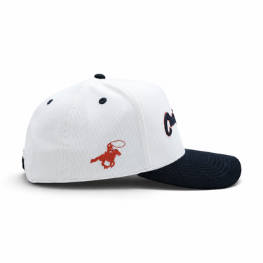Classic Cowboy The Magnolia white and navy corduroy snapback, side view of the red cowboy logo.