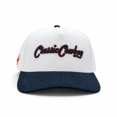 Classic Cowboy The Magnolia white and navy corduroy snapback with navy script embroidery, front view.